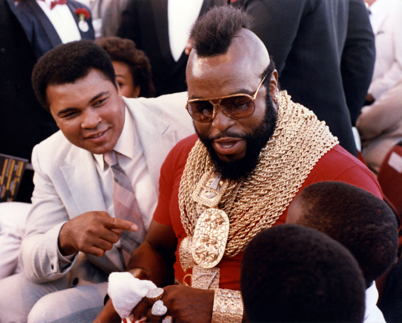 LAS VEGAS, NV - SEPTEMBER 21: Former boxer Muhammad Ali and celebrity actor Mr. T talk to fans before the IBF Heavyweight Title fight with Michael Spinks and Larry Holmes on September 21, 1985 at the Riviera Hotel & Casino in Las Vegas, Nevada. Robert Riger/Getty Images